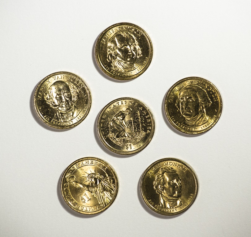 Металлические доллары последней серии — с портретами президентов США прошлых эпох и со статуей Свободы или землепашцем на реверсе.